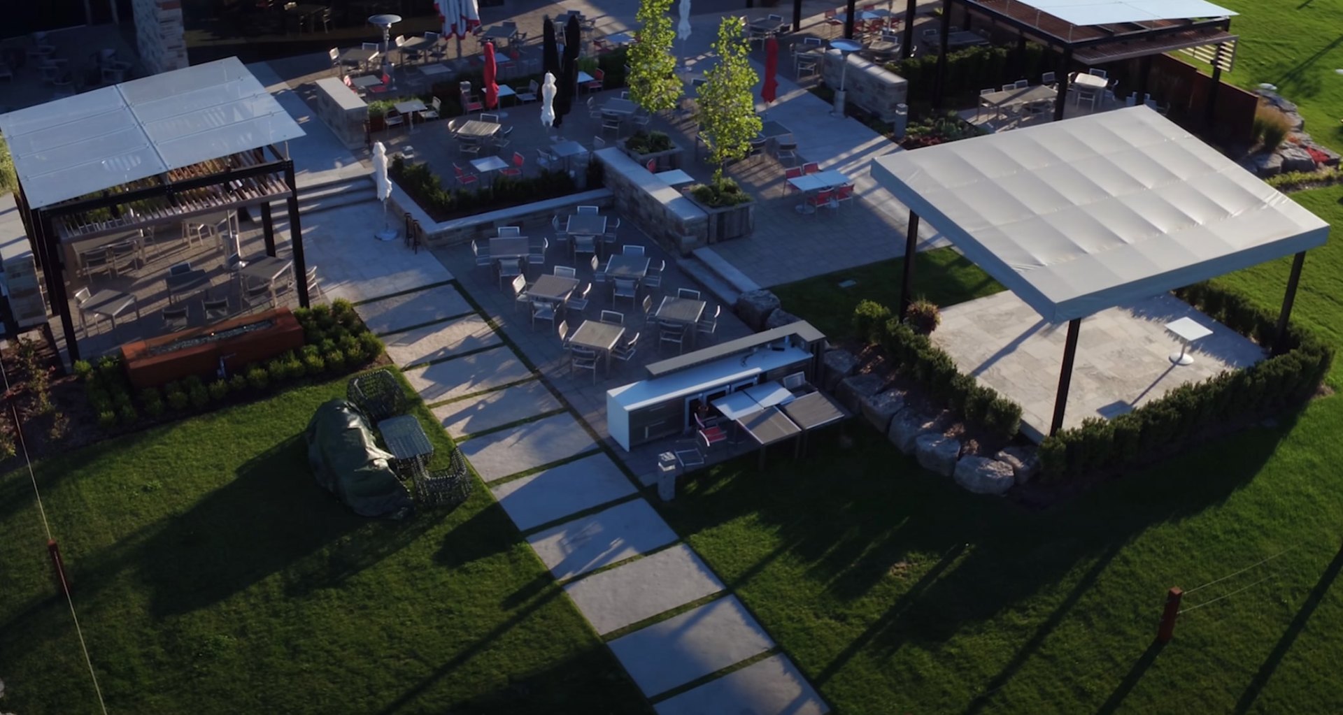Modern backyard landscape design with elegant hardscaping and outdoor entertaining area